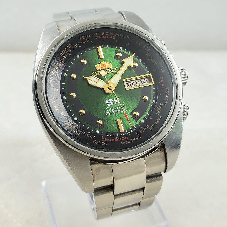 Orient World Time Crystal Automatic Day/date Green Men's Watch — Pre-Owned, photo 1